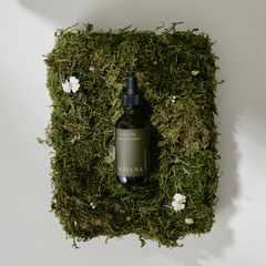 Photo of Subluna Adrenal RX adrenal restoration blend bottle on moss background, stocked by Born Primal in Australia