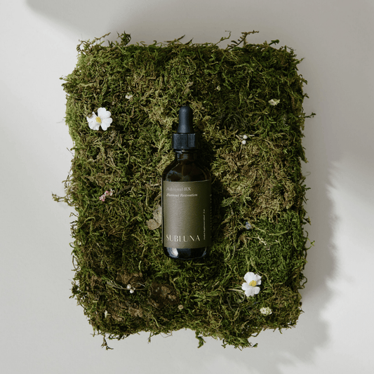 Photo of Subluna Adrenal RX adrenal restoration blend bottle on moss background, stocked by Born Primal in Australia